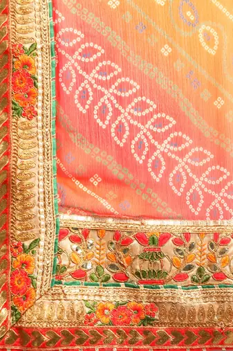 Pink bandhani saree with lace border and unstitched blouse piece