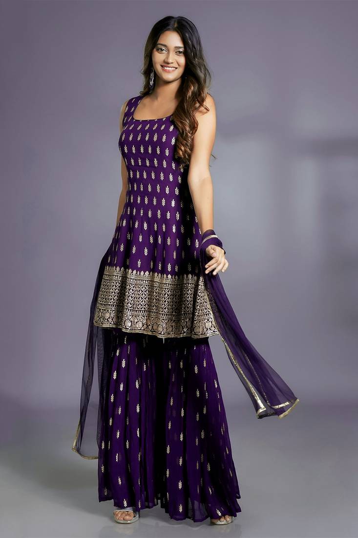 PURPLE  SHARARA SET AND MATCHING KURTA TOP WITH GOLD BUTIS, EMBROIDERED AND A MATCHING DUPATTA.