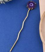 Women gold toned hairstick.