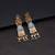 Off white color kundan earrings