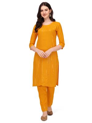 Trendy designer yellow color rayon fabric sequence work kurta set 1