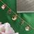 Christmas bracelet santa claus,snowman,wreath,candy cane & unicorn gold plated 5 charms for women