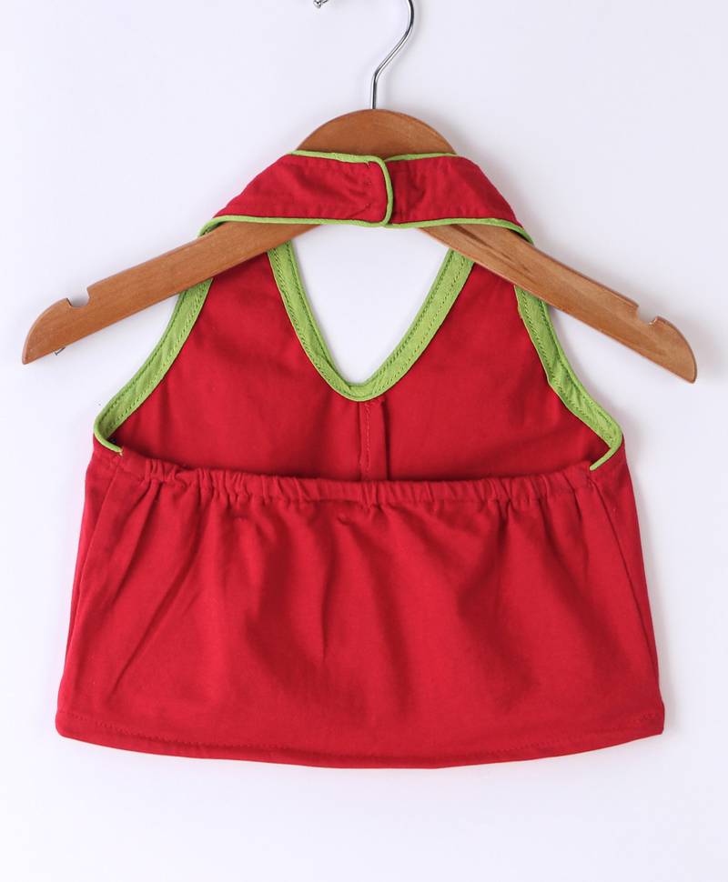 Twisha Girls Solid Knit Top Embellished With Pompom & Potali Buttons With Motif Foil Printed Dhoti-Red & Orange