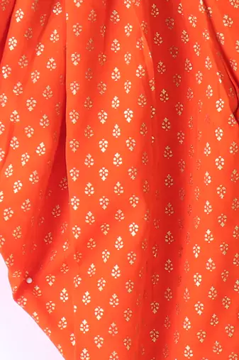 Twisha Girls Solid Knit Top Embellished With Pompom & Potali Buttons With Motif Foil Printed Dhoti-Red & Orange
