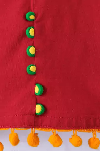 Twisha Girls Solid Knit Top Embellished With Pompom & Potali Buttons With Printed Dhoti - Red & Green