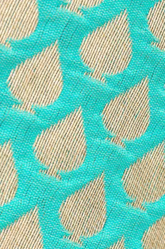 Twisha Girls brocade sleeveless Top & Net Ghagra - Sea Green