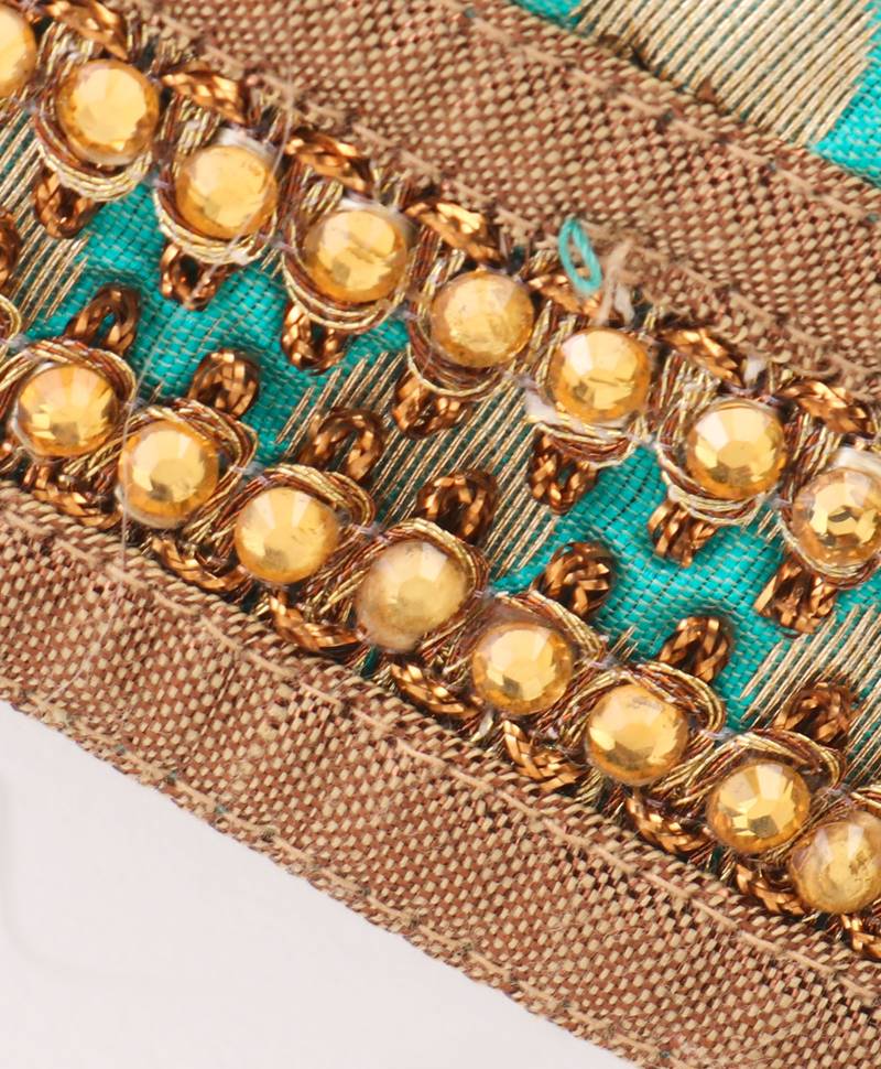 Twisha Girls brocade sleeveless Top & Net Ghagra - Sea Green