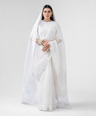 White dori embroidered organza silk saree 1