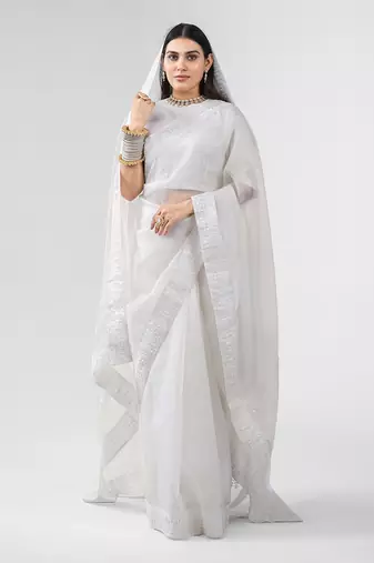 White dori embroidered organza silk saree