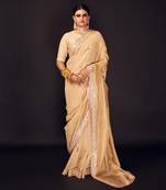 Beige embroidered tissue silk saree