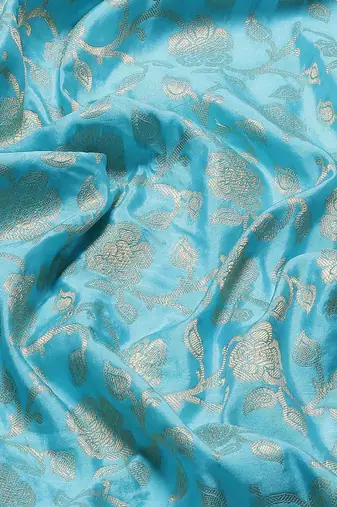 Silk Land  teal  woven design art silk saree 