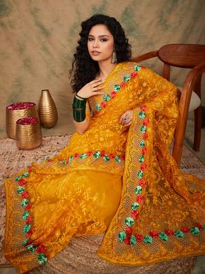 Yellow color embroidery work net saree with blouse 1
