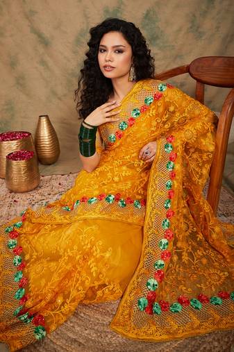 Yellow color embroidery work net saree with blouse