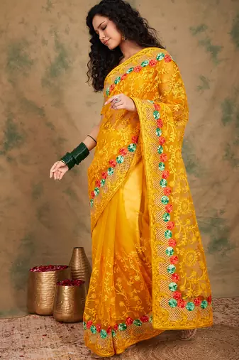 Yellow color embroidery work net saree with blouse