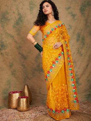 Yellow color embroidery work net saree with blouse 4