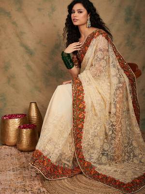 White color embroidery work net saree with blouse 1