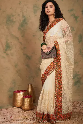 White color embroidery work net saree with blouse