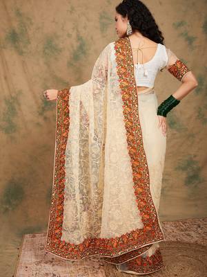 White color embroidery work net saree with blouse 5