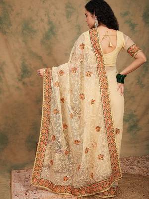 Chiku Color Embroidery Work Net Saree With Blouse 5