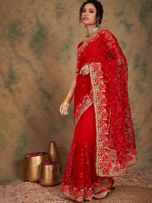 Red color embroderied work net saree with blouse 4