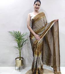 ready to wear light green faux georgette embroidered saree