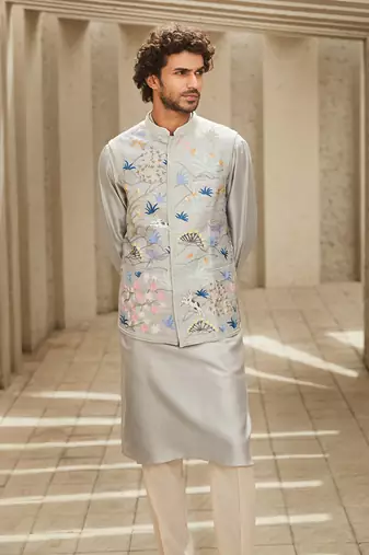The ivory-hued aari grey jodhpuri jacket