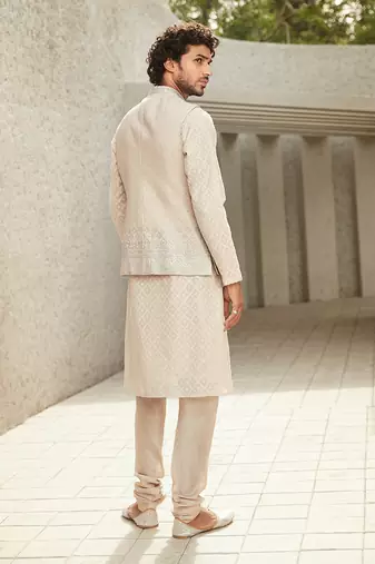 The mod-minimal offwhite jodhpuri jacket