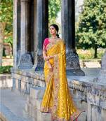 Heavy And Glamorous Mustard Colour Zari Woven Faux Banarasi Silk Saree