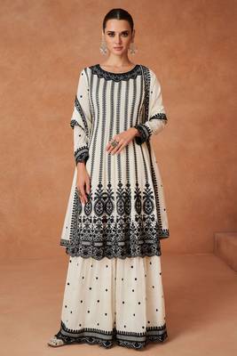 White premium silk thread embroidred with sequince work salwar kameez(free xl size full stitch) 1