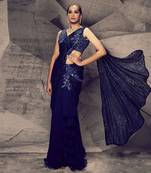 The shimmering blue skirt saree