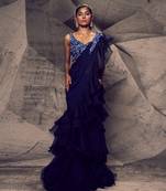 The shimmering blue ruffle saree