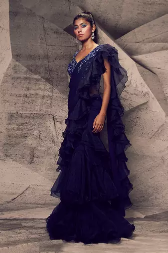 The shimmering blue ruffle saree