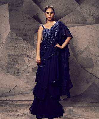 The shimmering blue layered saree 1