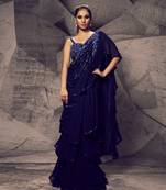 The shimmering blue layered saree