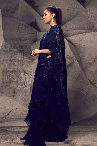 The shimmering blue layered saree