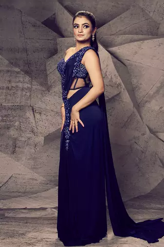 The shimmering blue corset saree