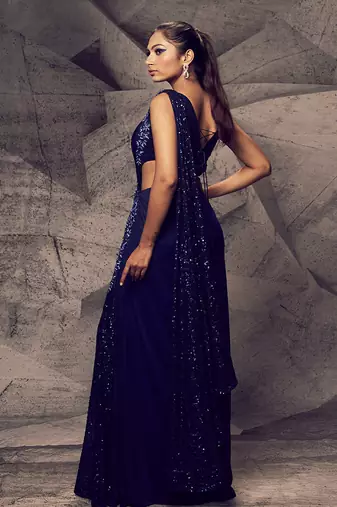 The shimmering blue cross saree