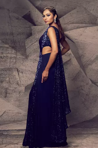 The shimmering blue cross saree