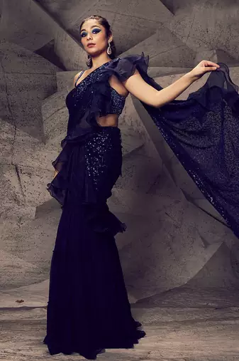 The shimmering blue sharara saree