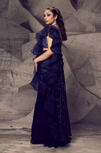 The shimmering blue sharara saree