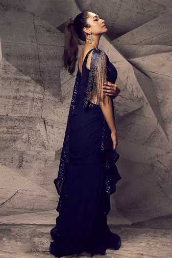 The shimmering blue gown saree