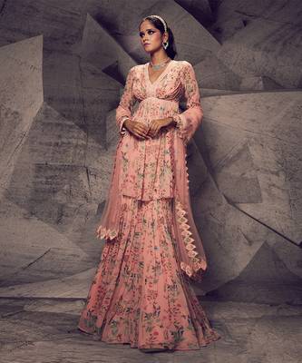 The pink floral peplum suit 1
