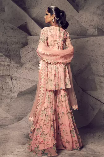 The pink floral peplum suit