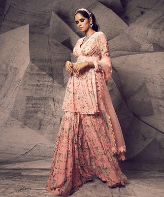 The pink floral peplum suit 3