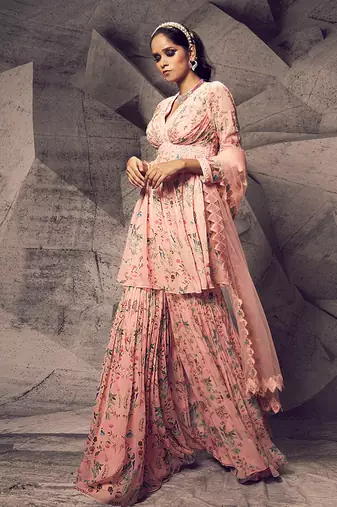 The pink floral peplum suit