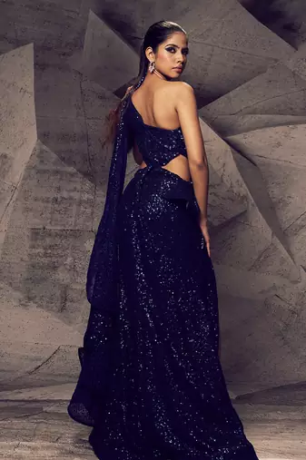 The shimmering blue slit gown