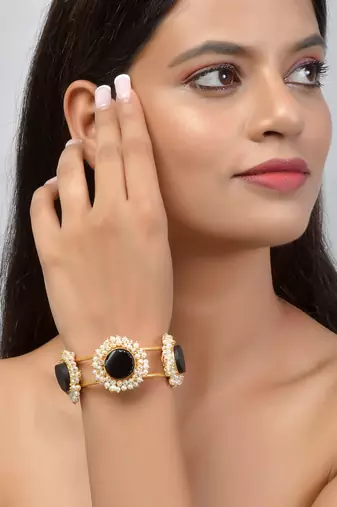 Gold plated black stone kada bracelet