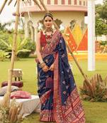 Elora Printed Patola Silk Blend Saree With Contrast Border And Blouse For Women (Blue)