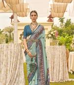 Elora  Printed Patola Silk Blend Saree With Contrast Border And Blouse For Women (Ice Blue)