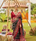 Elora  printed patola silk saree with contrast border and blouse for women (black)